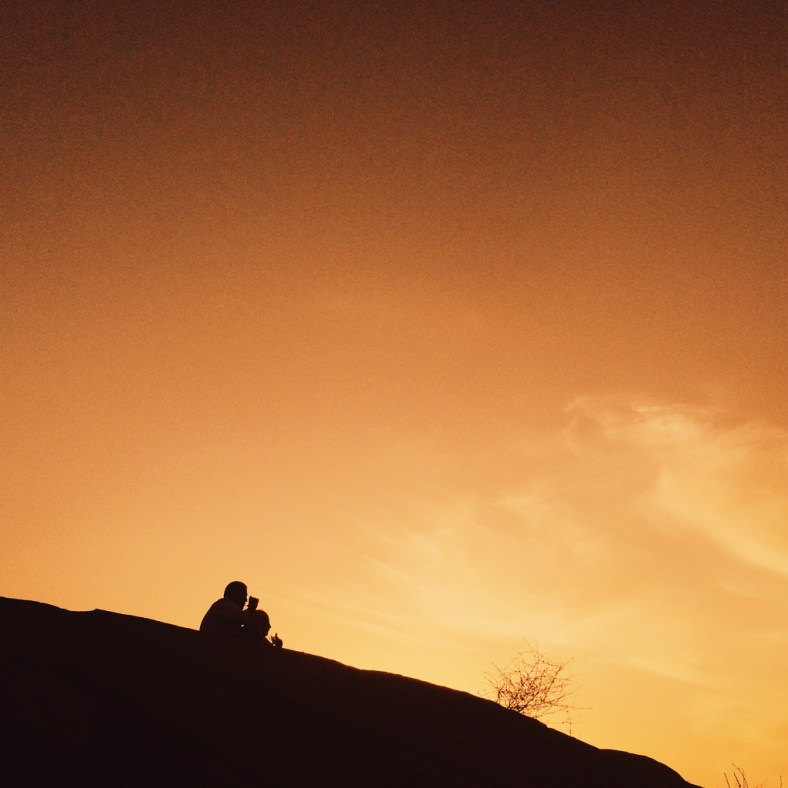 At the top of the mountain 2 Iranian men enjoying the sunset
